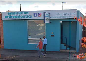 Dr Andrew McNaught - EVOLUTION ORTHODONTICS