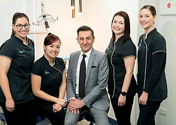Dr Con Laparidis - THE ORTHODONTIST