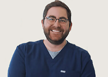 Dr Joe Formosa - TORQUE ORTHODONTICS