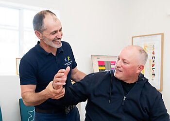 Dr Jon Powderly - CANBERRA SPINE CENTRE