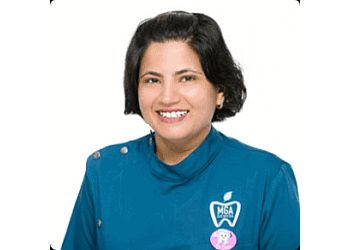 Dr. Savi Sharma - MGA Dental